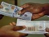 Naira Depreciates Slightly Amid Falling Reserves and Global Caution – Matthew Tegha Blog Naira to dollar.jpg