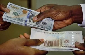 Naira Depreciates Slightly Amid Falling Reserves and Global Caution – Matthew Tegha Blog Naira to dollar.jpg