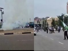 June 12: Police fire tear gas at protesters, journalists in Abuja Police fire tear gas at protesters.jpg