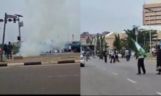 Police-fire-tear-gas-at-protesters.jpg Police fire tear gas at protesters.jpg